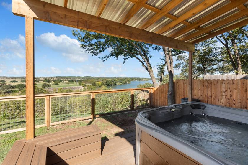 The Guadalupe Bluff farmhouse hot tub overlooking the guadalupe river